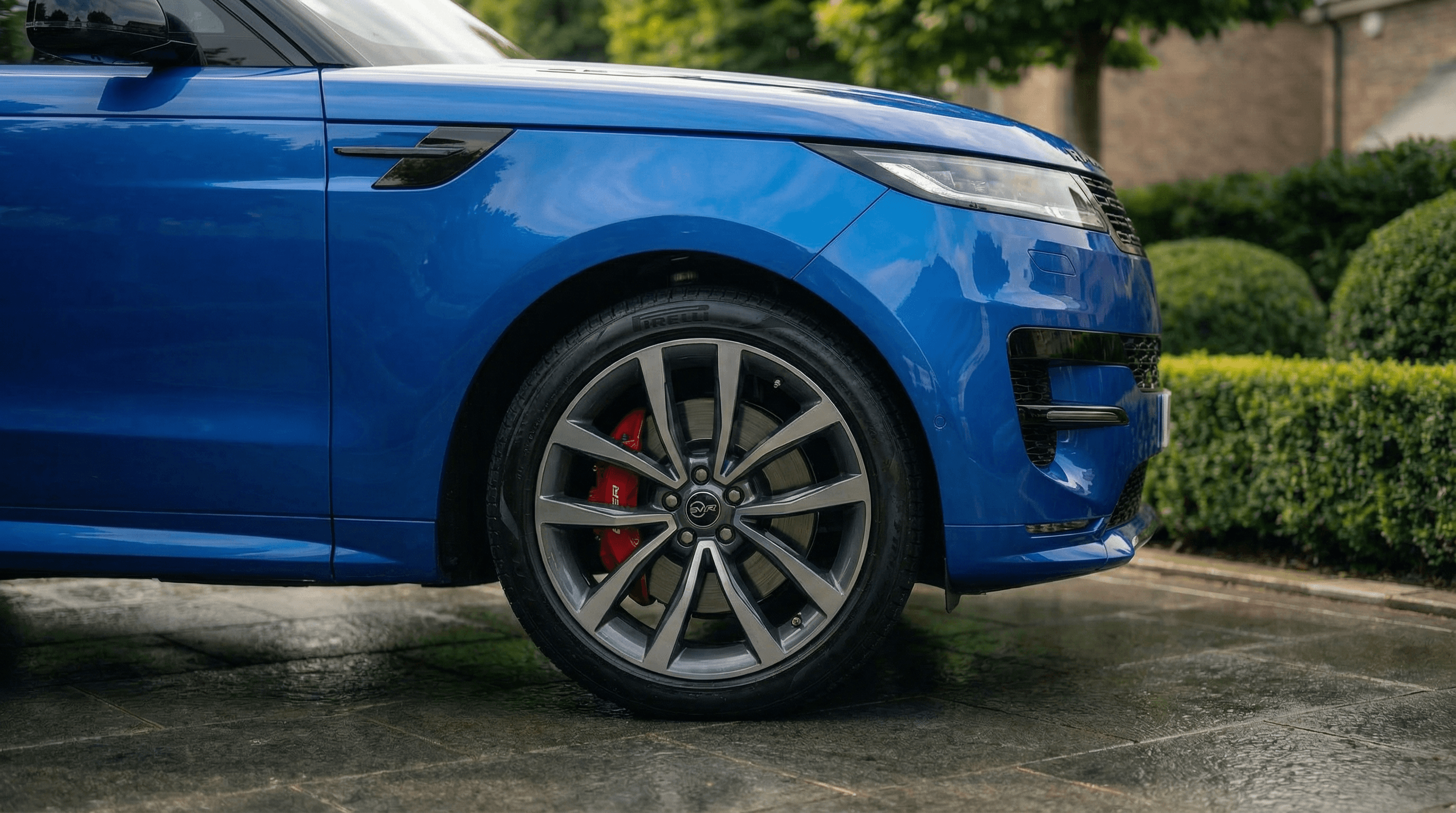 Range Rover Sport Svr Spectral Blue fender view - supercar hire UK