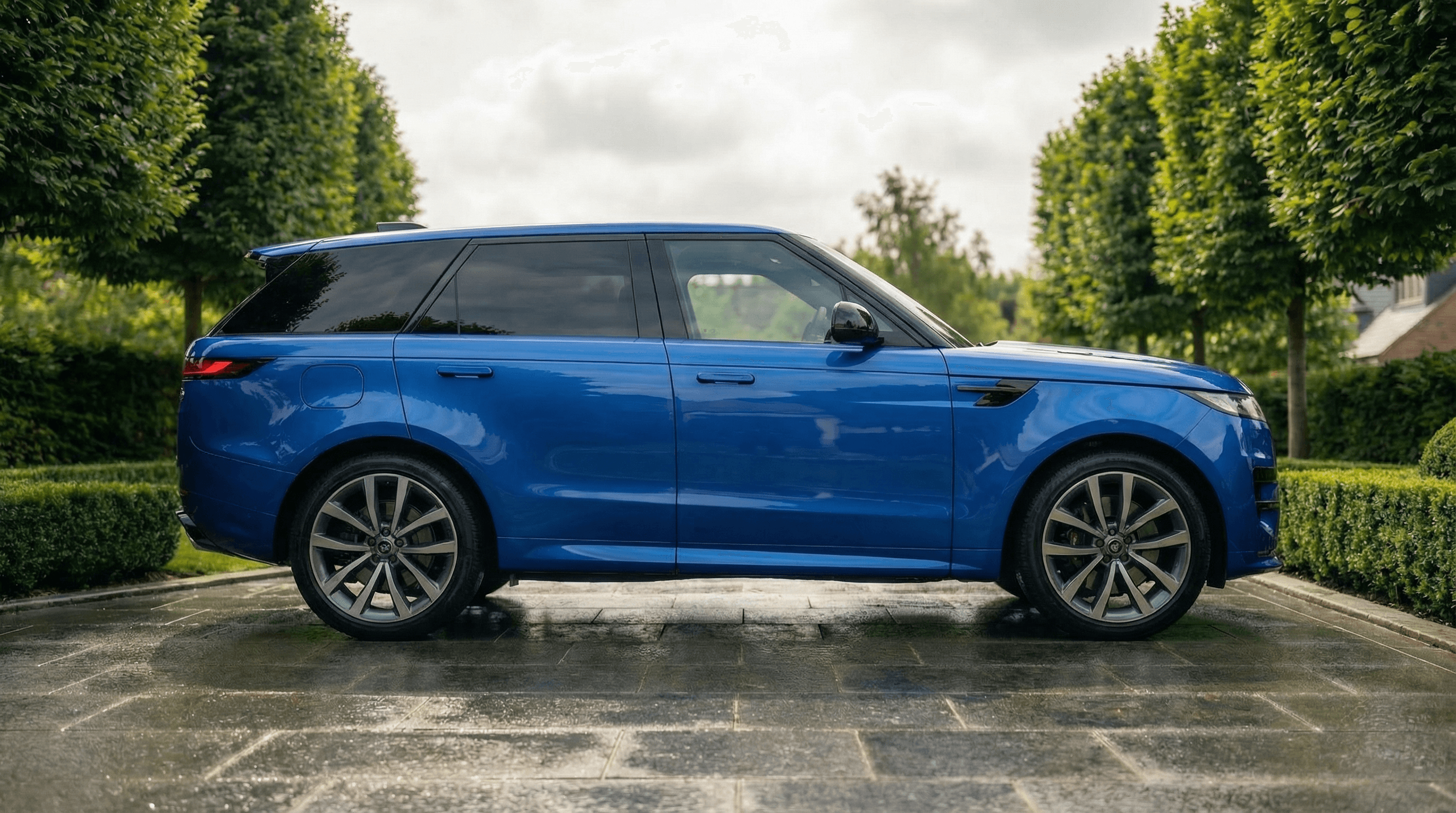 Range Rover Sport Svr Spectral Blue side view - supercar hire UK