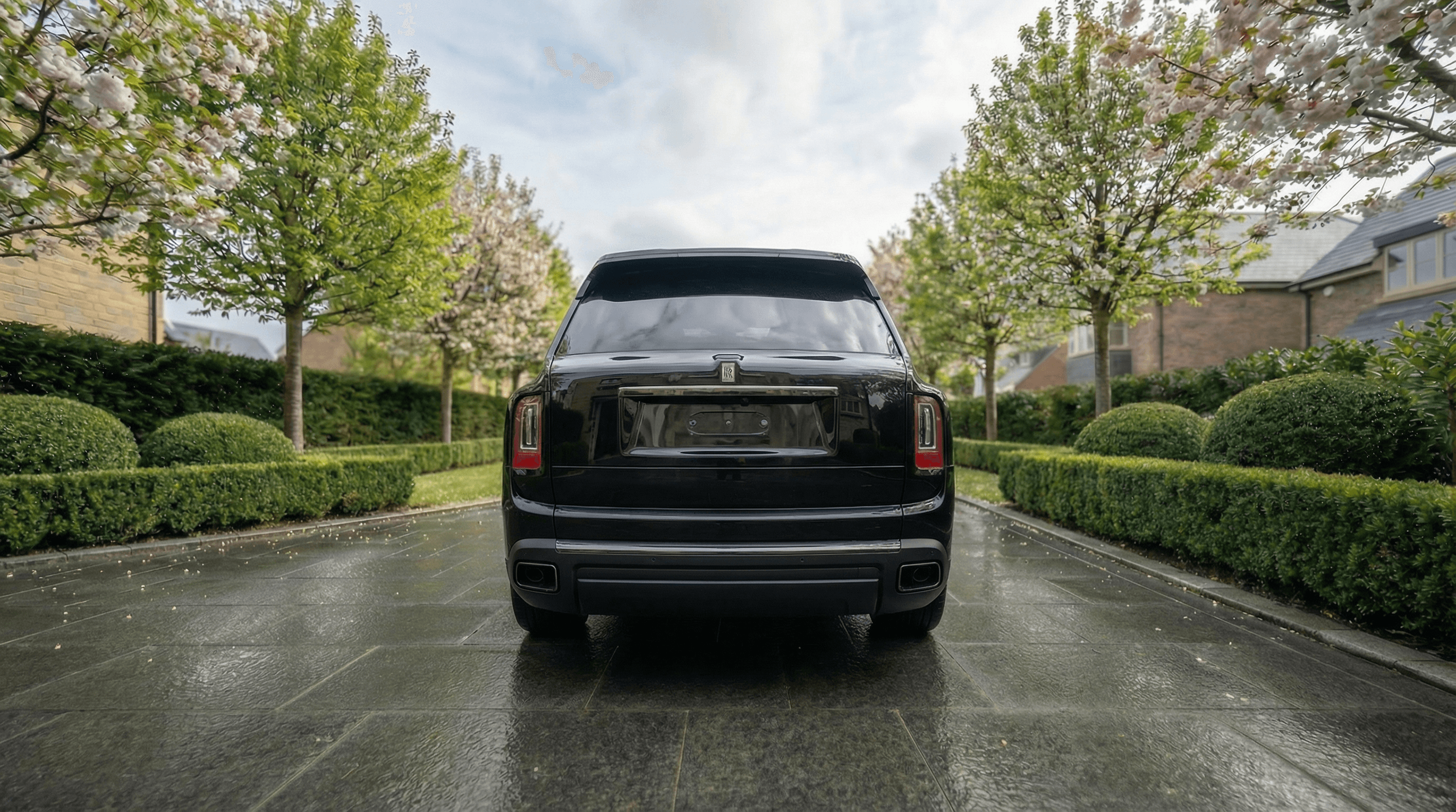 Rolls-Royce Cullinan back view - supercar hire UK