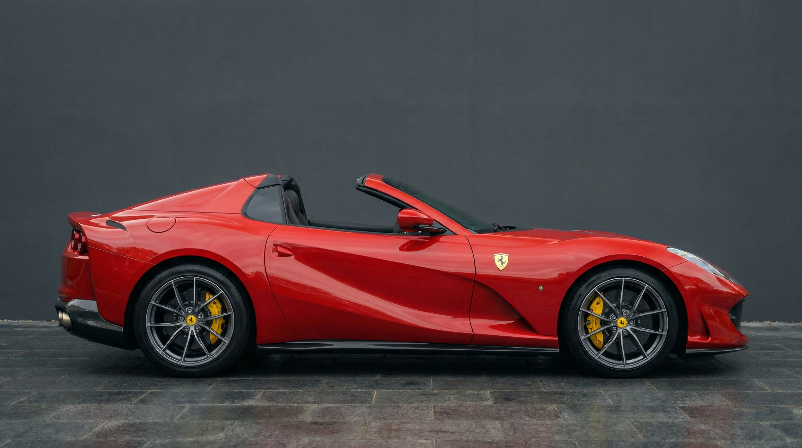 Ferrari 812 GTS side view — included in Leeds film car hire with cleaning, preparation, and location delivery